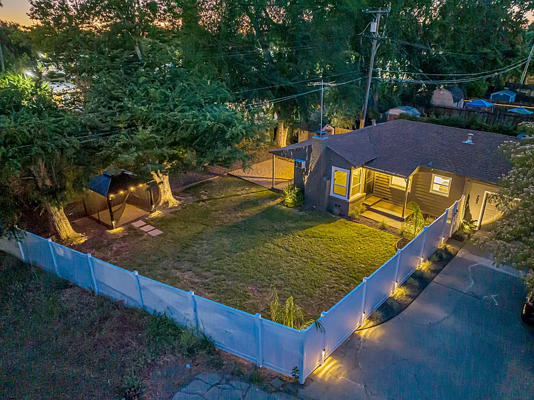Solar landscape lights throughout.