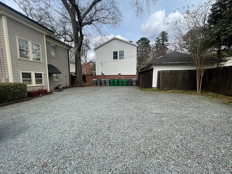 large private parking lot at rear with separate locked rear entrance