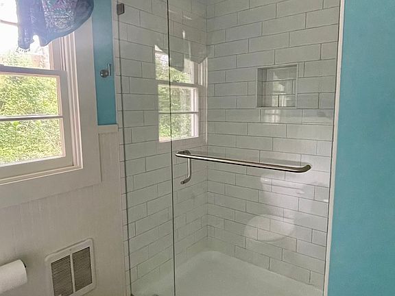 Bath with a walk in shower