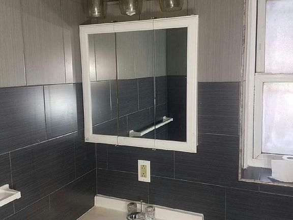 2nd image of 1065 E 99th Street # Top Floor
