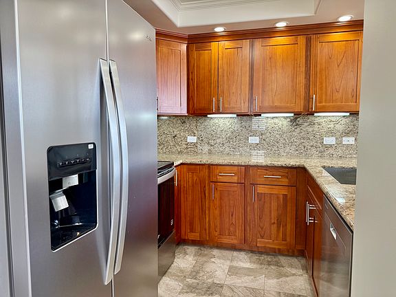 2nd image of 2444 Hihiwai St Penthouse 2401