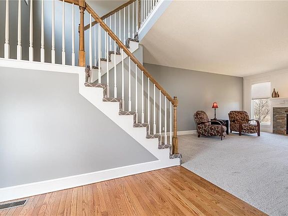 Hardwood floor at entrance.