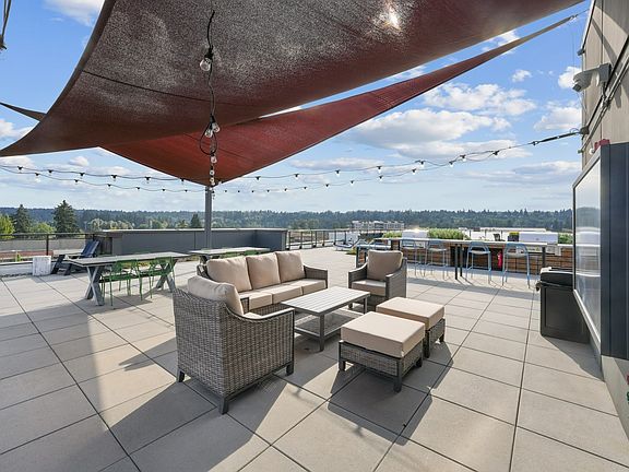 Host, relax, or recharge in the vibrant rooftop lounge.