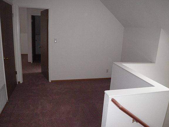Upstairs hall has room for desk or exercise equipment