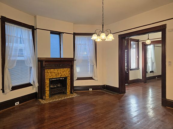 Formal Dining Room with fireplace and 9ft, ceiling