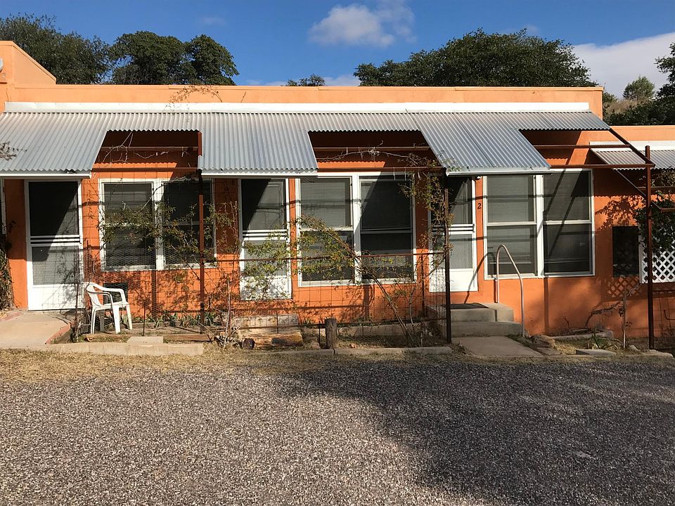 South Facade of Unit 2. Architect designed. Has terrace overlooking stream (in season).