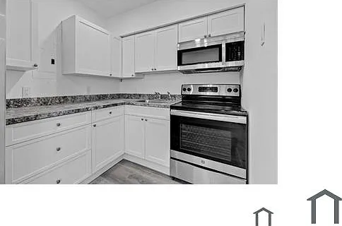 54 NW 62nd St — Photo 1