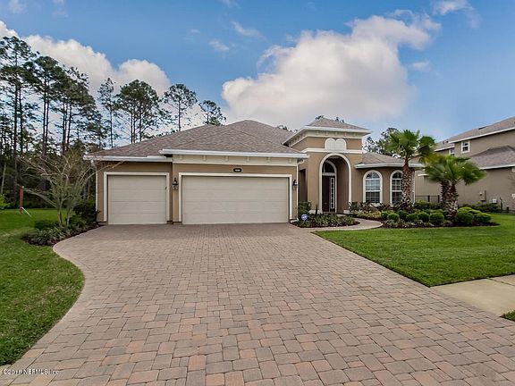 Paver Driveway with 3 Car Garage