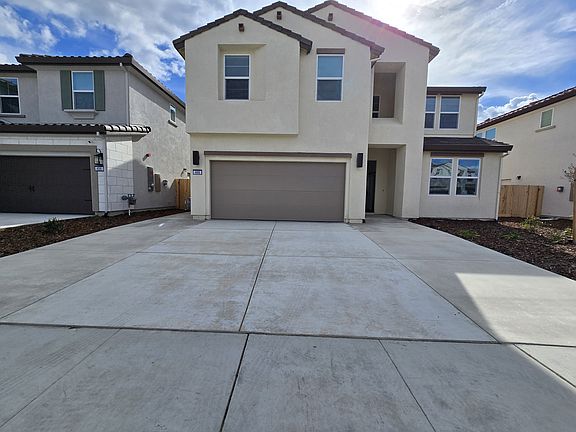 Extended driveway parking - can fit 3 to 4 cars