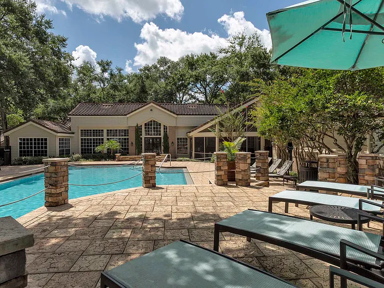 Resort-Inspired Pool with Sundeck and Lounge Seating