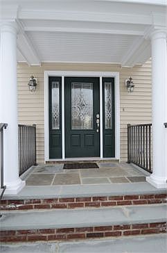 Impressive Exterior Entry: Columned and Leaded Glass Door
