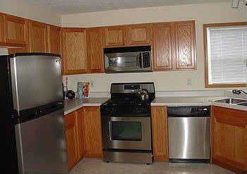 Kitchen Upgraded With Stainless Steel Applicances
