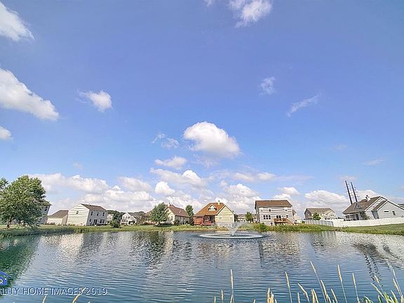 Neighborhood pond and fountain.