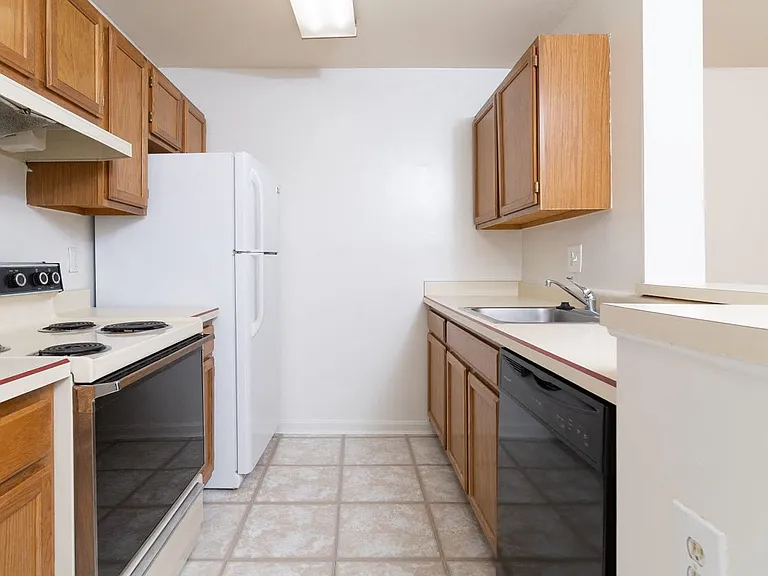 Kitchen areas with bar and ample cabinet space