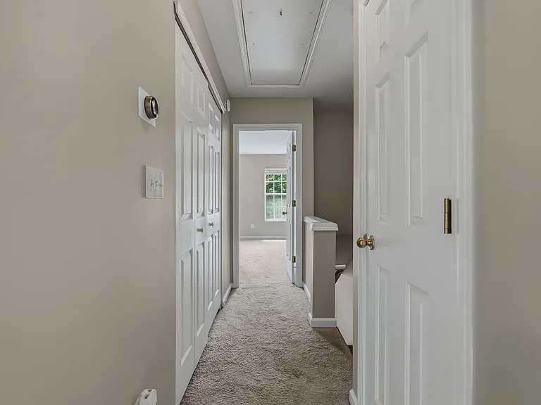 Hallway between both upstairs bedrooms