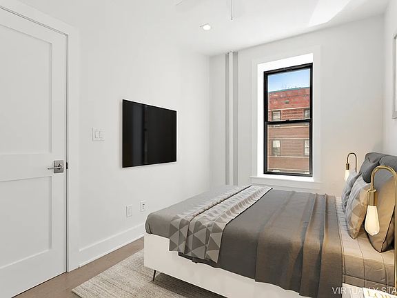 5th image of 321 E 12th St APT 16