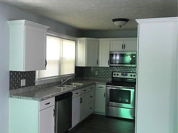 5th image of 7049 Camby Rd