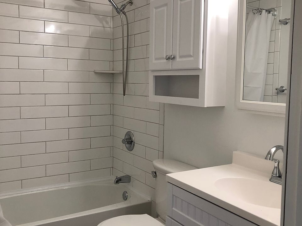 Bathtub and shower combo, new vanity also in 2022.