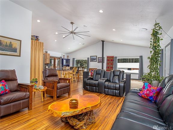 Light and bright great room with vaulted ceilings and tons of windows!