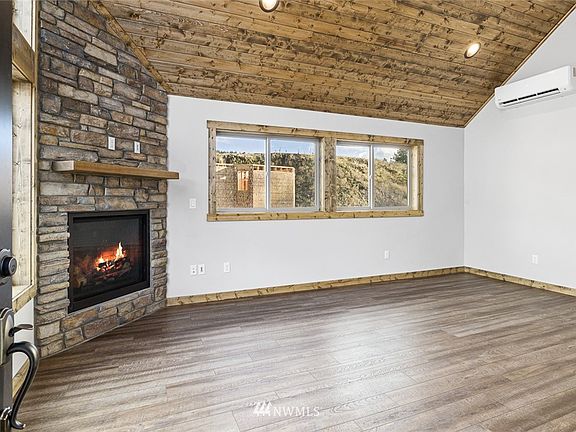 Cozy propane fireplace. Photo from a similar cabin.