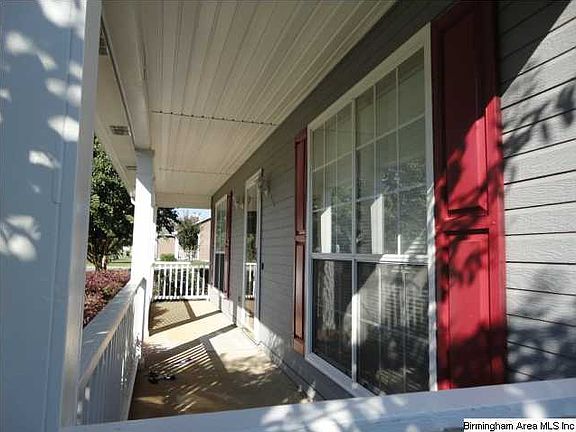 Porch spans the entire width of the house.