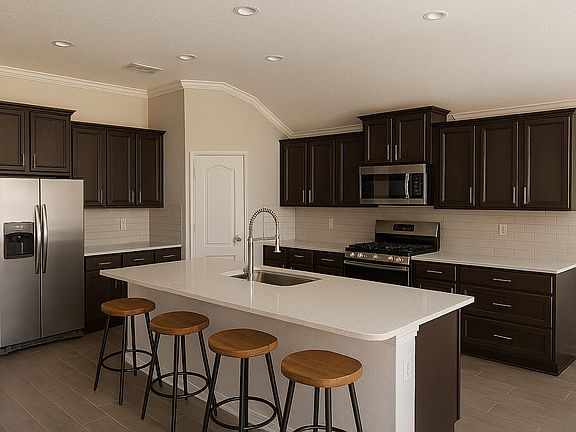 Kitchen - with pantry and island, open to dining and living room