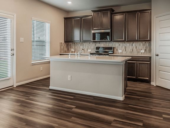 Cook delicious meals in the gourmet kitchen.