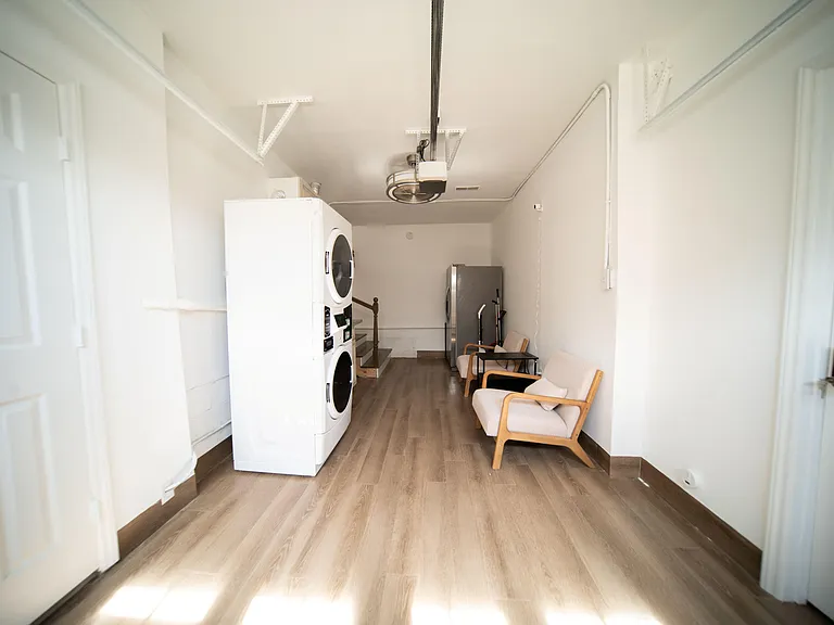 Common area for paid laundry and second fridge