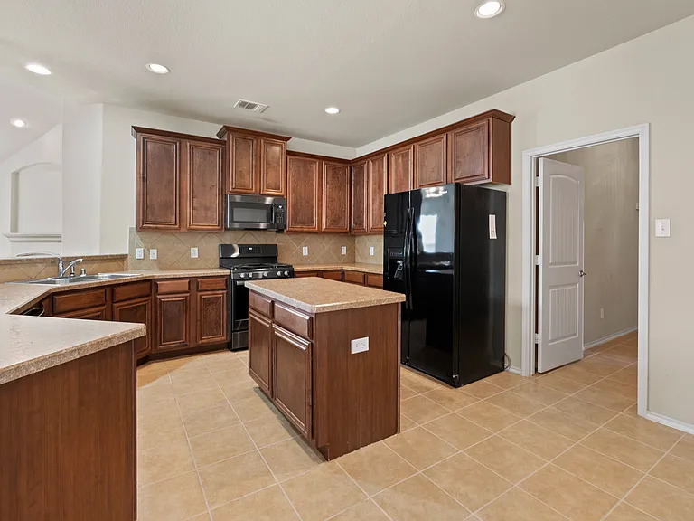 9716 Mulligan Dr — Photo 11