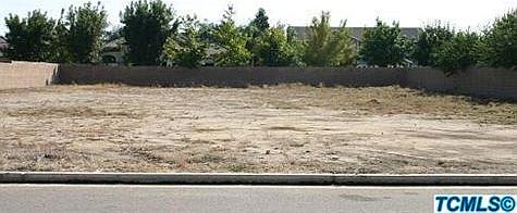 Lot, facing south. Street behind if Orielo