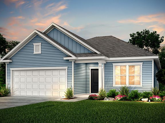 Morgan New Home Exterior LC3A with board and batten accent and covered front doorway.