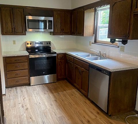 Kitchen has all new appliances including built in microwave.