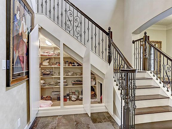Tons of storage located under the staircase.