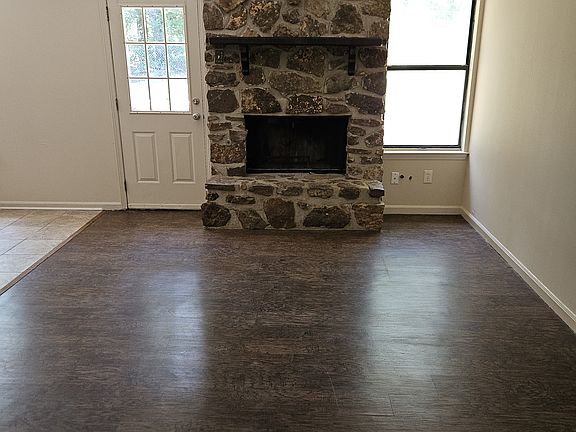 Living Room with Fireplace (which has gas starter)