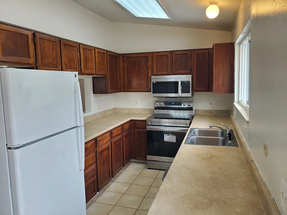 NEW stainless steel;
Microwave, Stove and Dishwasher.