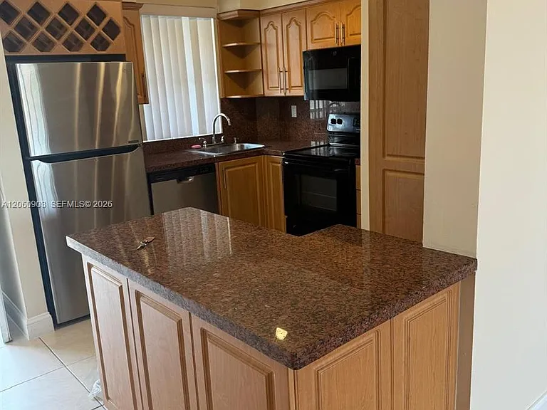 6045 NW 186th St #309 — Photo 10