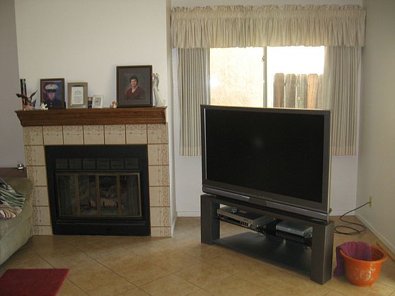 Fireplace & Upgraded Tile Flooring in Family Room