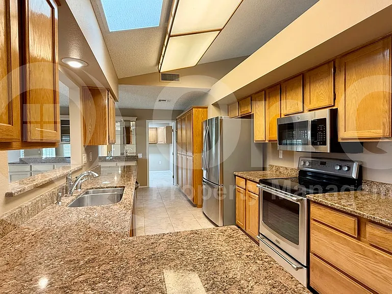14607 W Yosemite Dr — Photo 35