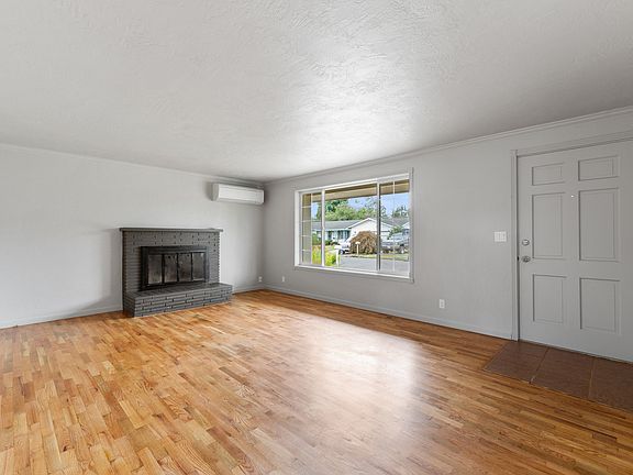 Refinished hardwood floors & new ductless heat pump with AC