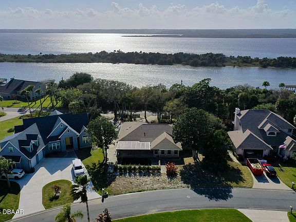 Located Beachside between the river and the Ocean