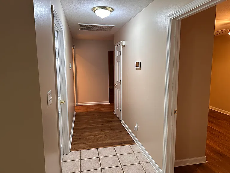 Hallway leading to entrance.