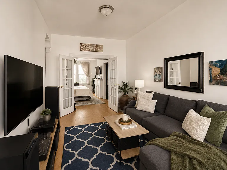 living room leading to the main bedroom