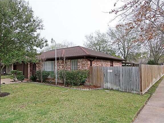 Den w/fireplace and built in Desk.