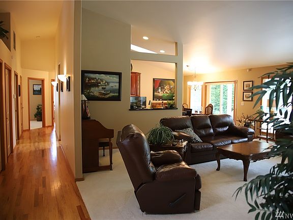 Everyone always wants to see the KITCHEN!! This kitchen is a chef's dream. Stainless steel appliances, propane stove, Verde granite counter-tops and a granite sink with an original butcher block island from Alaska and hardwood cherry cabinets. (No drooling please)