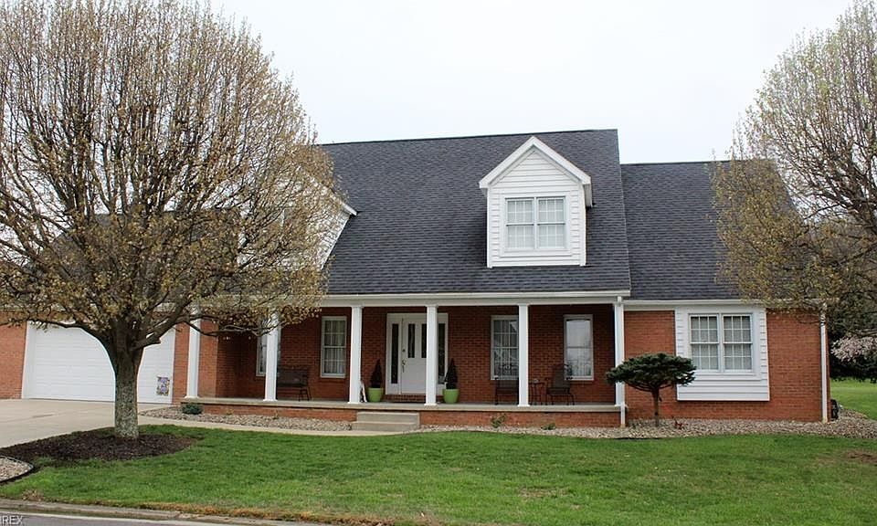 Immaculate Brick and Cedar Cape Cod with gorgeous golf course views.