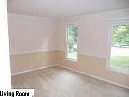 Family Room - New Carpet, New Chair Rail and New Crown Moulding