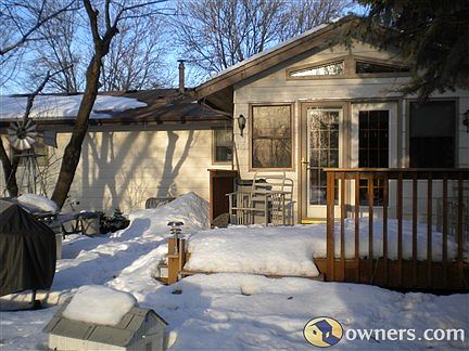 Sunshine filled four season porch stepping out to a great deck