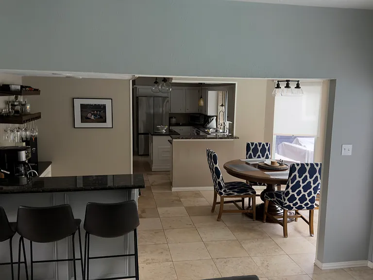 Bar and breakfast nook (breakfast nook has floor to ceiling windows, too