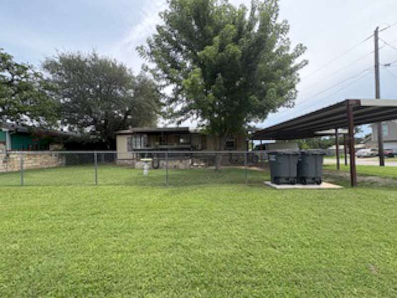 Fenced front and back yard