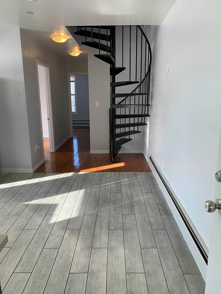 Building Photo - 65-61 Hull Ave #1